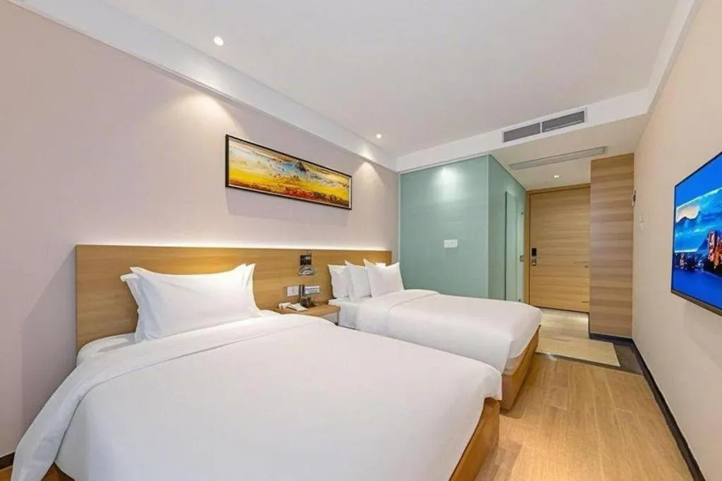 Bed in GreenTree Alliance Hotel Shenzhen Yantian District Dameisha