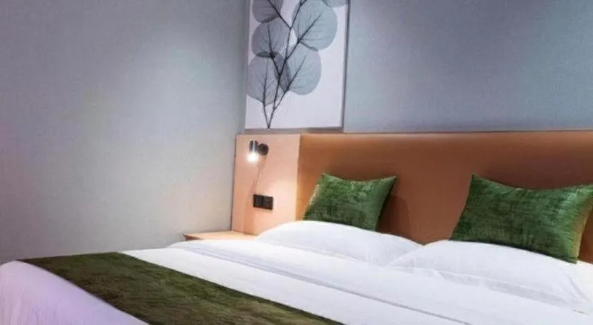 Bed in GreenTree Inn Express Suzhou Luzhi Ancient Town Scenic Area Xiaoshi Road