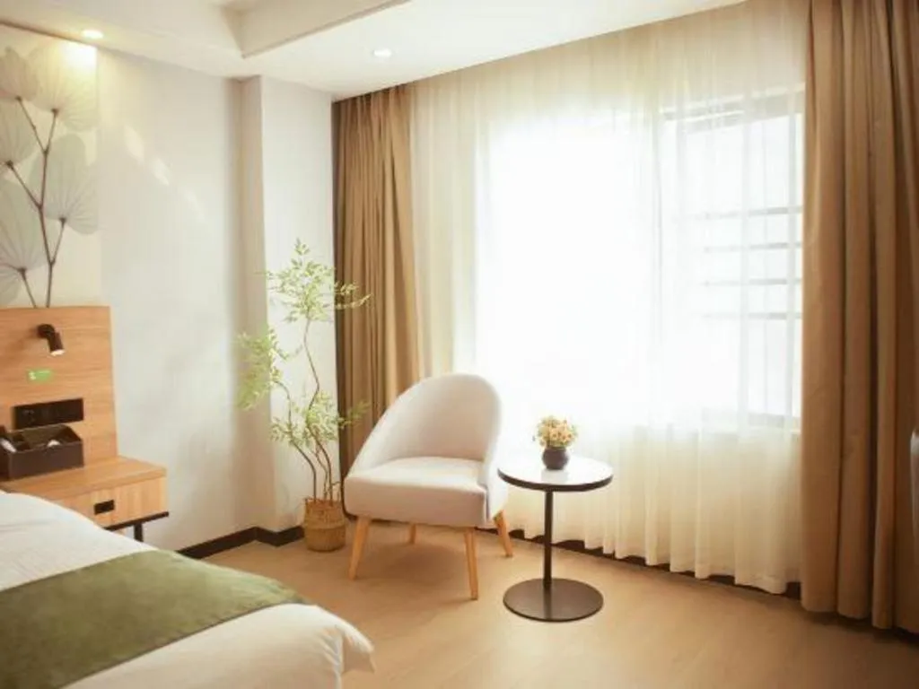 Bed in GreenTree Inn Express Hainan Haikou Haixiu Zhong Road