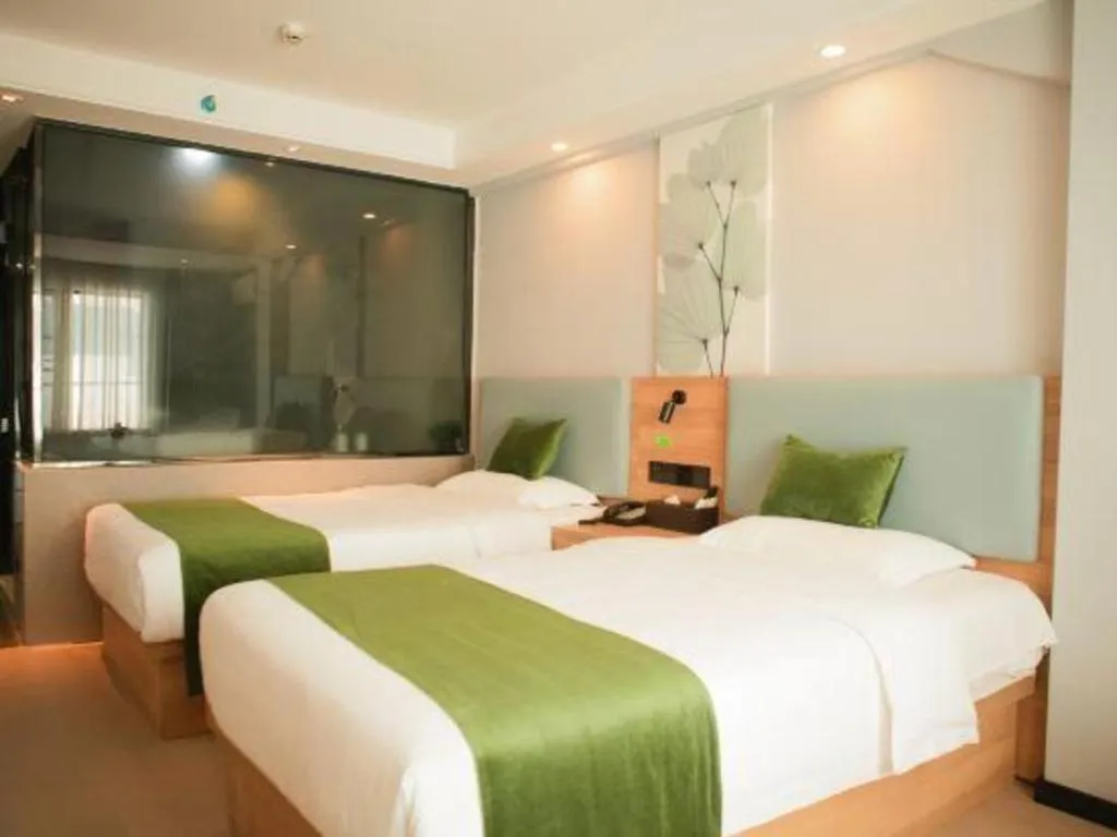 Bed in GreenTree Inn Express Hainan Haikou Haixiu Zhong Road
