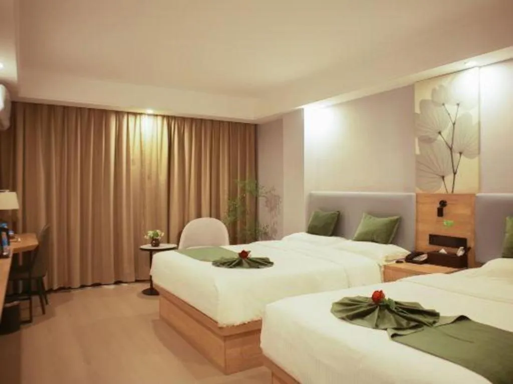 Bed in GreenTree Inn Express Hainan Haikou Haixiu Zhong Road