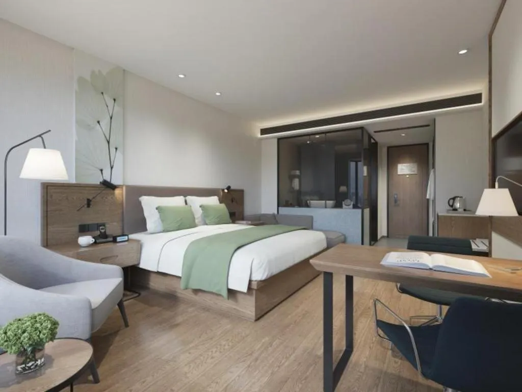 Bed in GreenTree Inn Express Hainan Haikou Haixiu Zhong Road