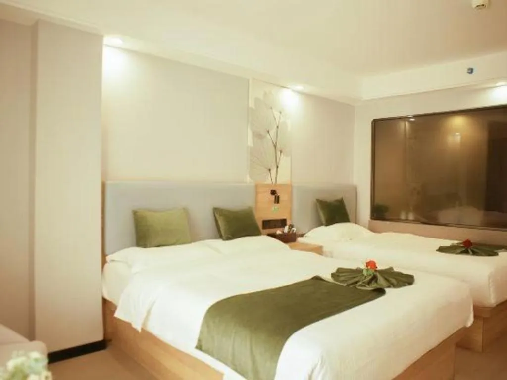 Bed in GreenTree Inn Express Hainan Haikou Haixiu Zhong Road