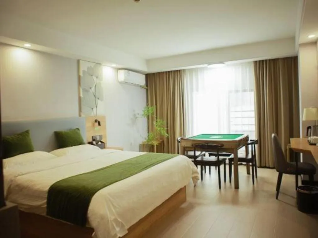 Bed in GreenTree Inn Express Hainan Haikou Haixiu Zhong Road