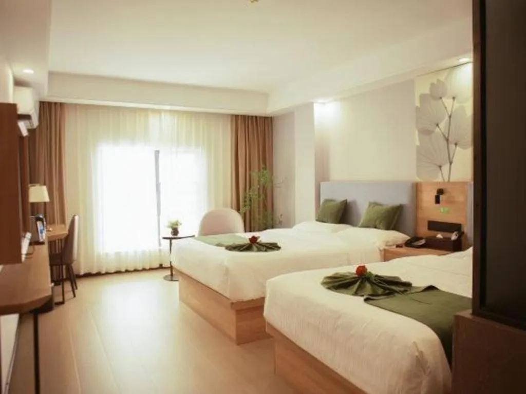 Bed in GreenTree Inn Express Hainan Haikou Haixiu Zhong Road