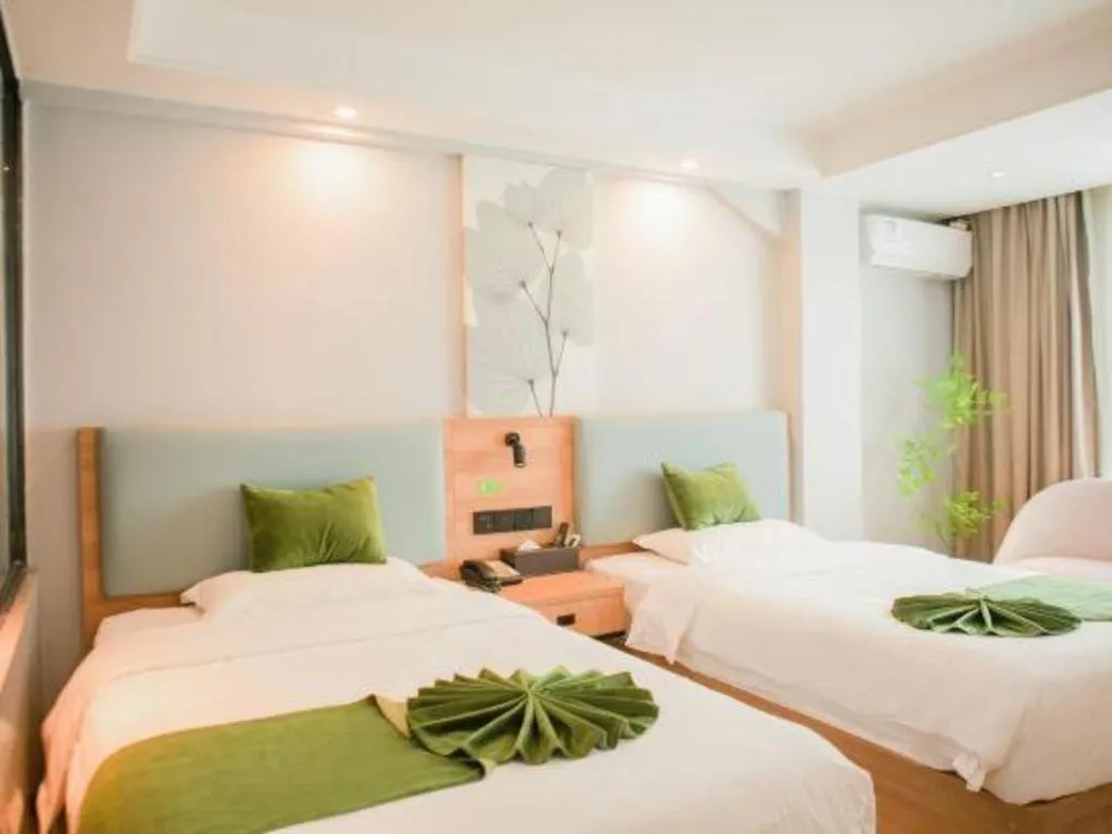 Bed in GreenTree Inn Express Hainan Haikou Haixiu Zhong Road