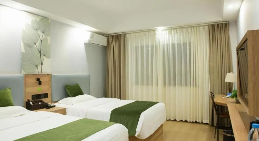 Bed in GreenTree Inn Express Hainan Haikou Haixiu Zhong Road