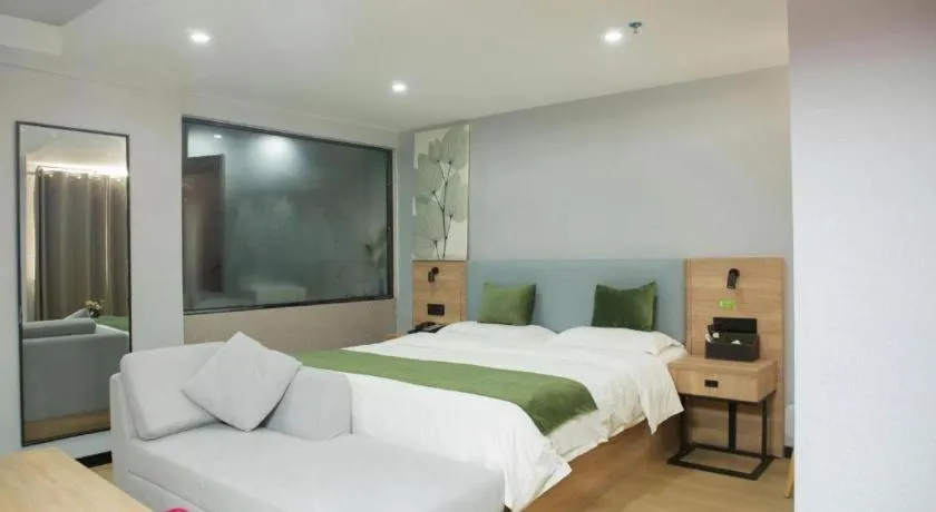 Bed in GreenTree Inn Express Hainan Haikou Haixiu Zhong Road