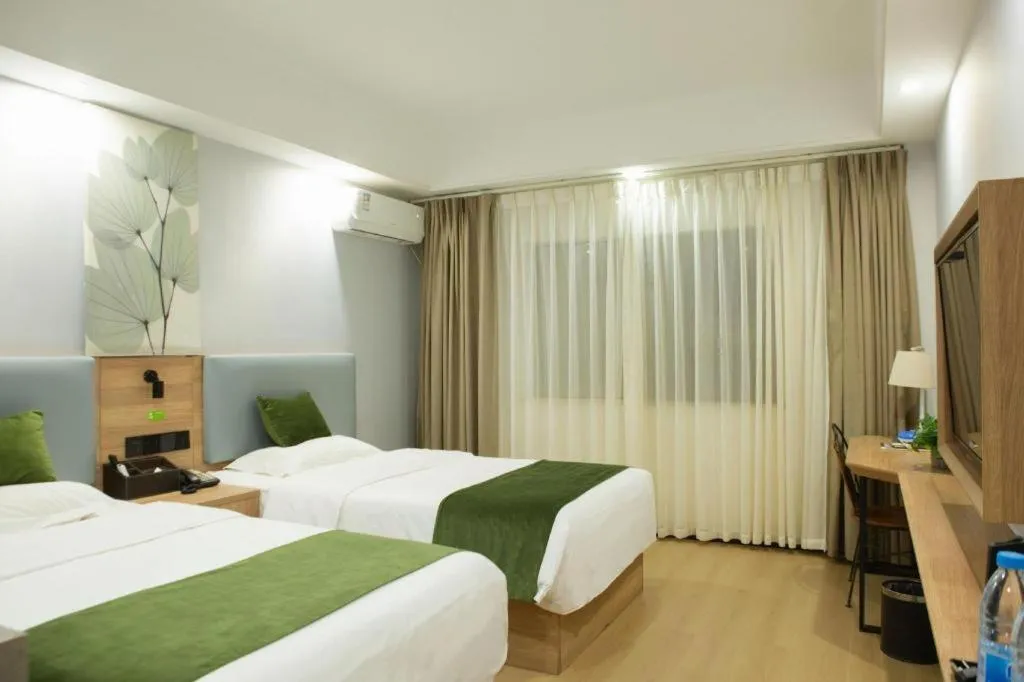 Bed in GreenTree Inn Express Hainan Haikou Haixiu Zhong Road