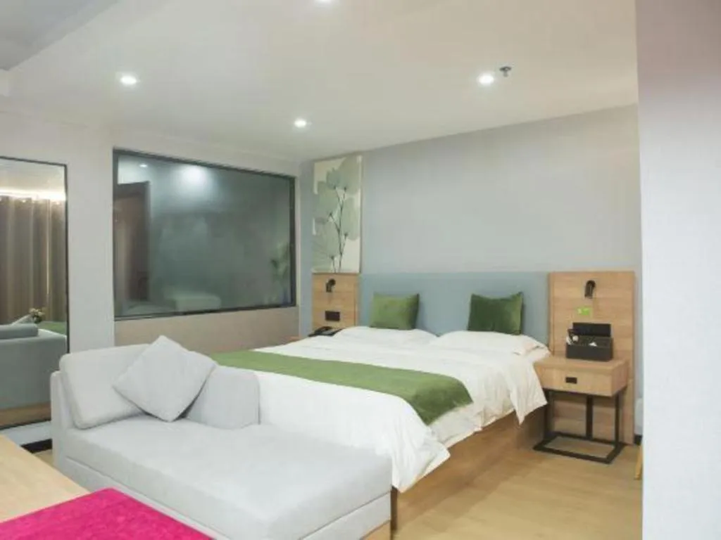 Bed in GreenTree Inn Express Hainan Haikou Haixiu Zhong Road
