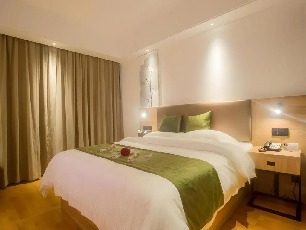 Bed in GreenTree Inn Express Hainan Haikou Haixiu Zhong Road