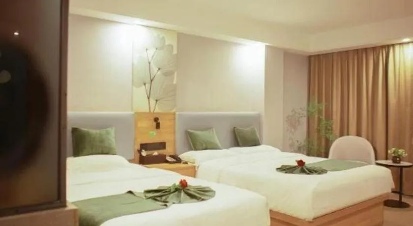 Bed in GreenTree Inn Express Hainan Haikou Haixiu Zhong Road