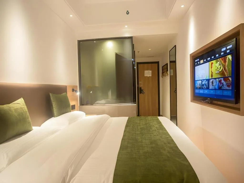 Bed in GreenTree Inn Express Hainan Haikou Haixiu Zhong Road