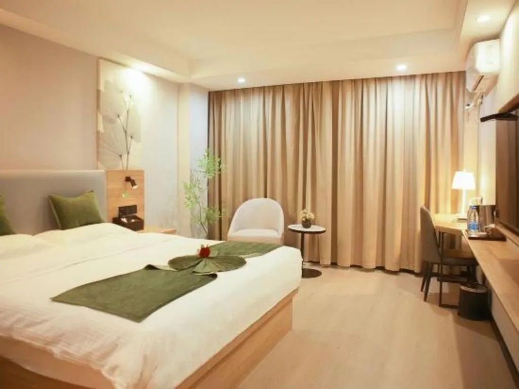 Bed in GreenTree Inn Express Hainan Haikou Haixiu Zhong Road