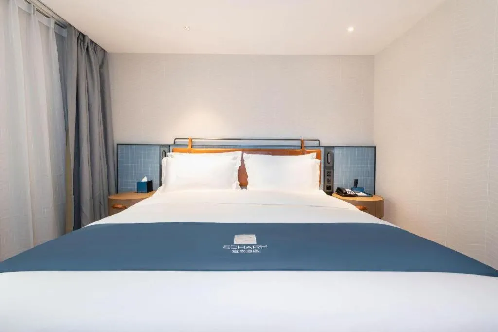 Bed in Echarm Hotel Guangzhou Tiyu West Raod Metro Station