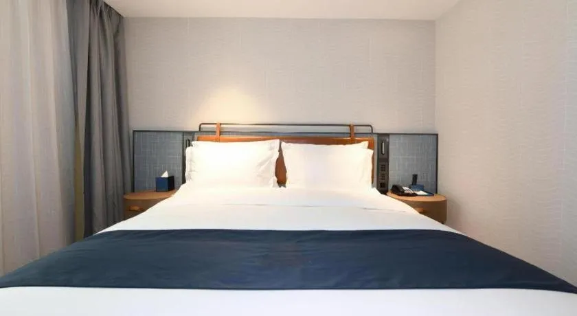 Bed in Echarm Hotel Guangzhou Tiyu West Raod Metro Station