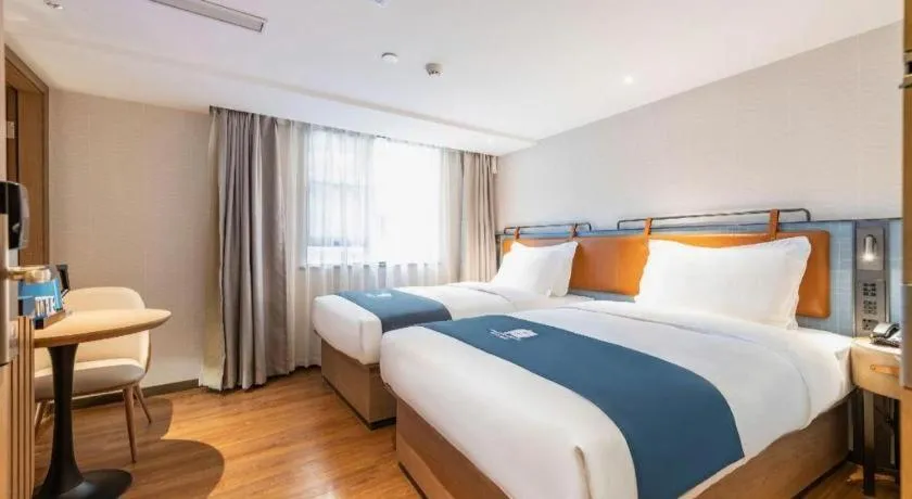 Bed in Echarm Hotel Guangzhou Tiyu West Raod Metro Station