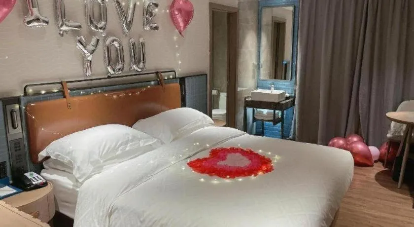 Bed in Echarm Hotel Guangzhou Tiyu West Raod Metro Station