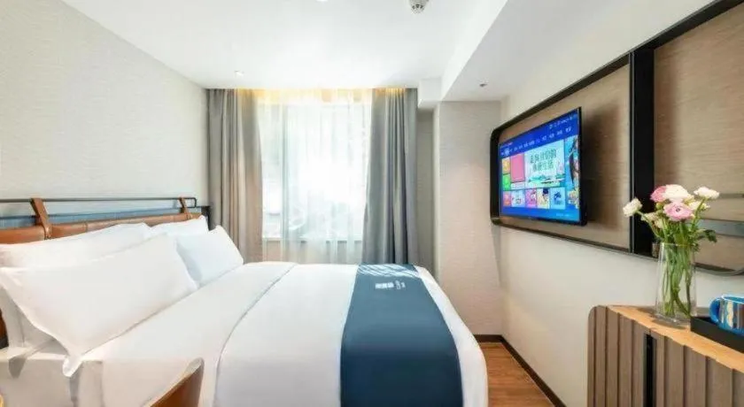 Bed in Echarm Hotel Guangzhou Tiyu West Raod Metro Station