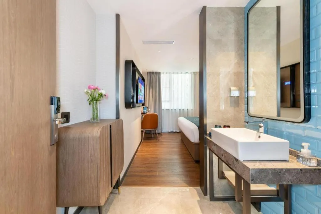 Bed in Echarm Hotel Guangzhou Tiyu West Raod Metro Station