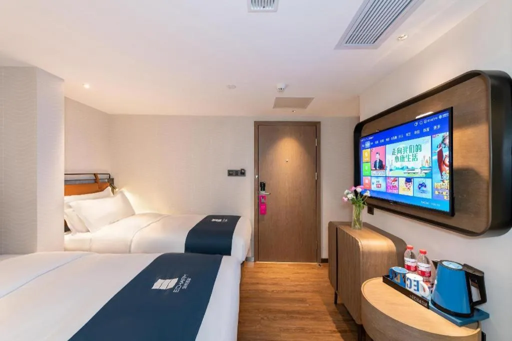 Bed in Echarm Hotel Guangzhou Tiyu West Raod Metro Station