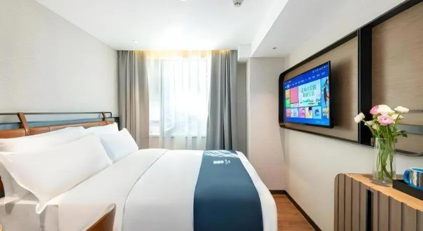 Bed in Echarm Hotel Guangzhou Tiyu West Raod Metro Station