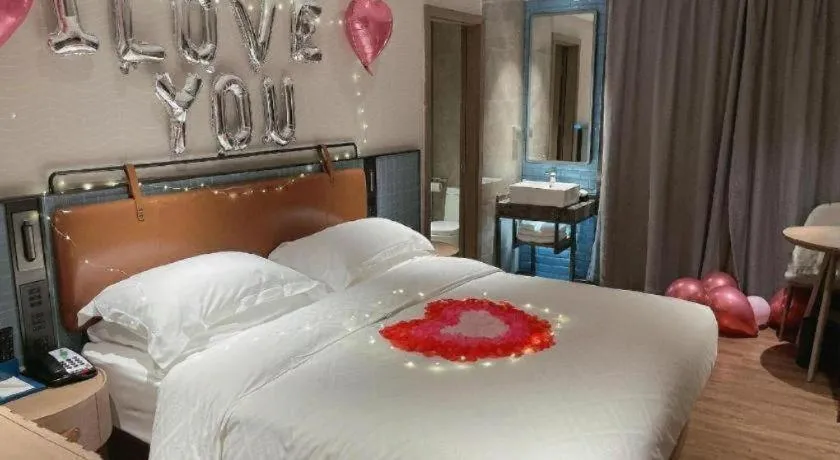 Bed in Echarm Hotel Guangzhou Tiyu West Raod Metro Station