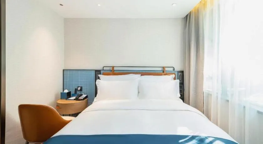 Bed in Echarm Hotel Guangzhou Tiyu West Raod Metro Station