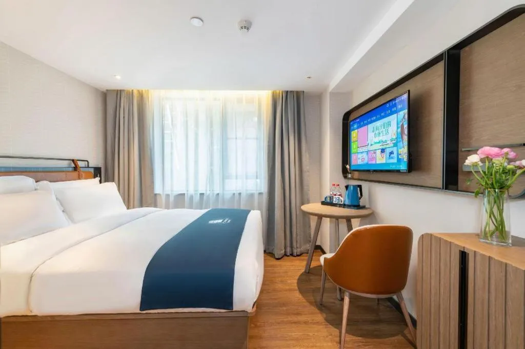 Bed in Echarm Hotel Guangzhou Tiyu West Raod Metro Station