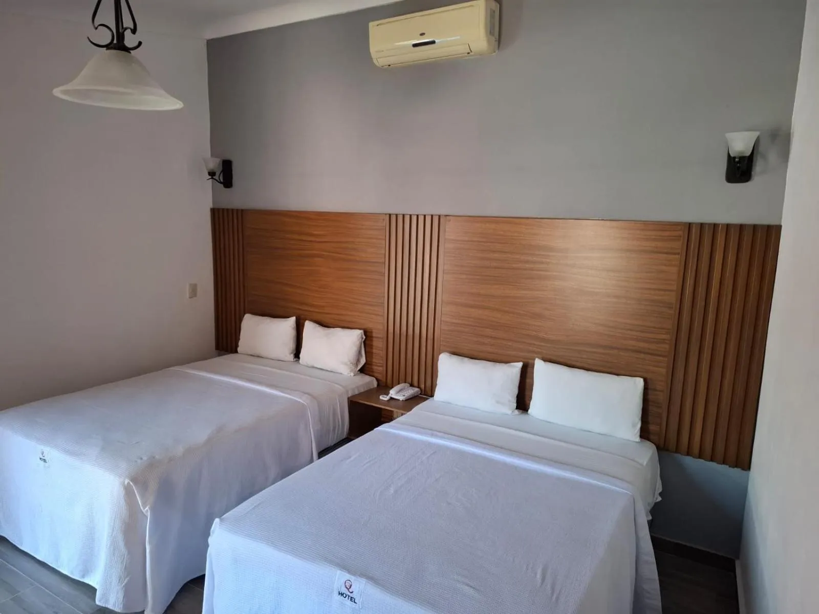 Bed in Hotel Aquiles