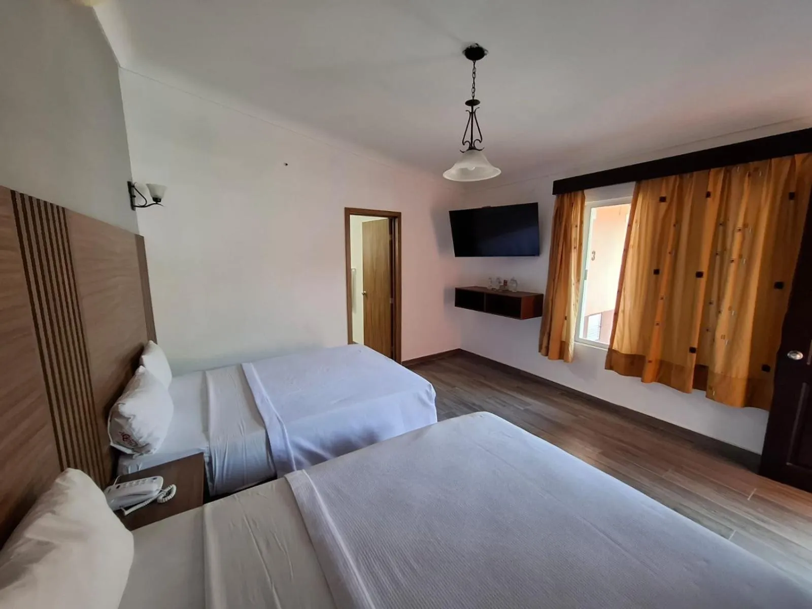 Bed in Hotel Aquiles