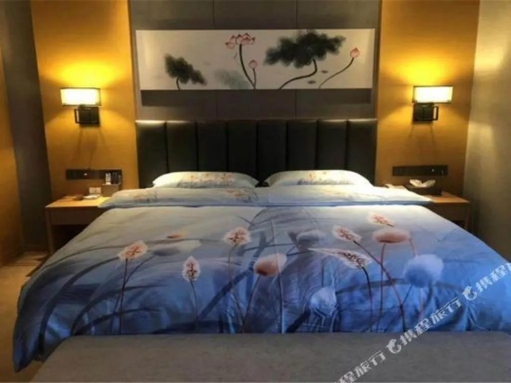 Bed in Borrman Hotel Jinan Yijia Exhibition Center Laotun Metro Station