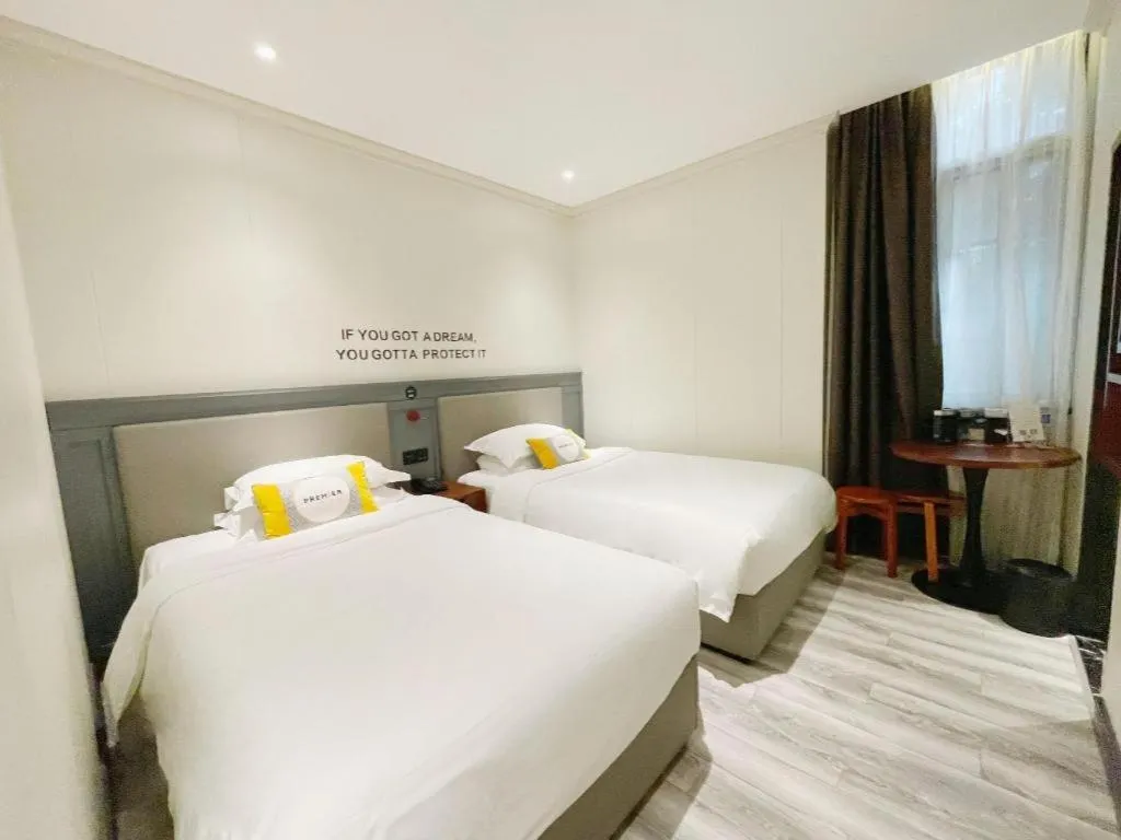 Bed in City Comfort Premier Hotel Guangzhou Tower Chigang Metro Station Pazhou Exhibition
