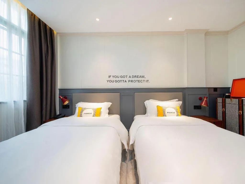 Bed in City Comfort Premier Hotel Guangzhou Tower Chigang Metro Station Pazhou Exhibition