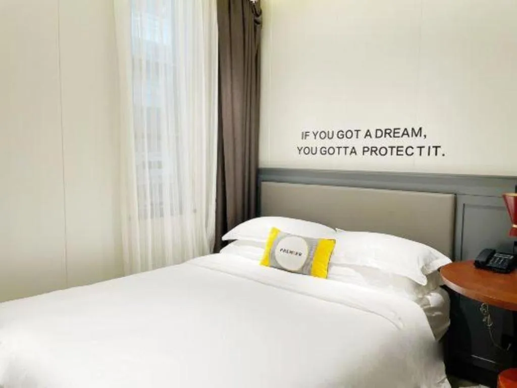 Bed in City Comfort Premier Hotel Guangzhou Tower Chigang Metro Station Pazhou Exhibition