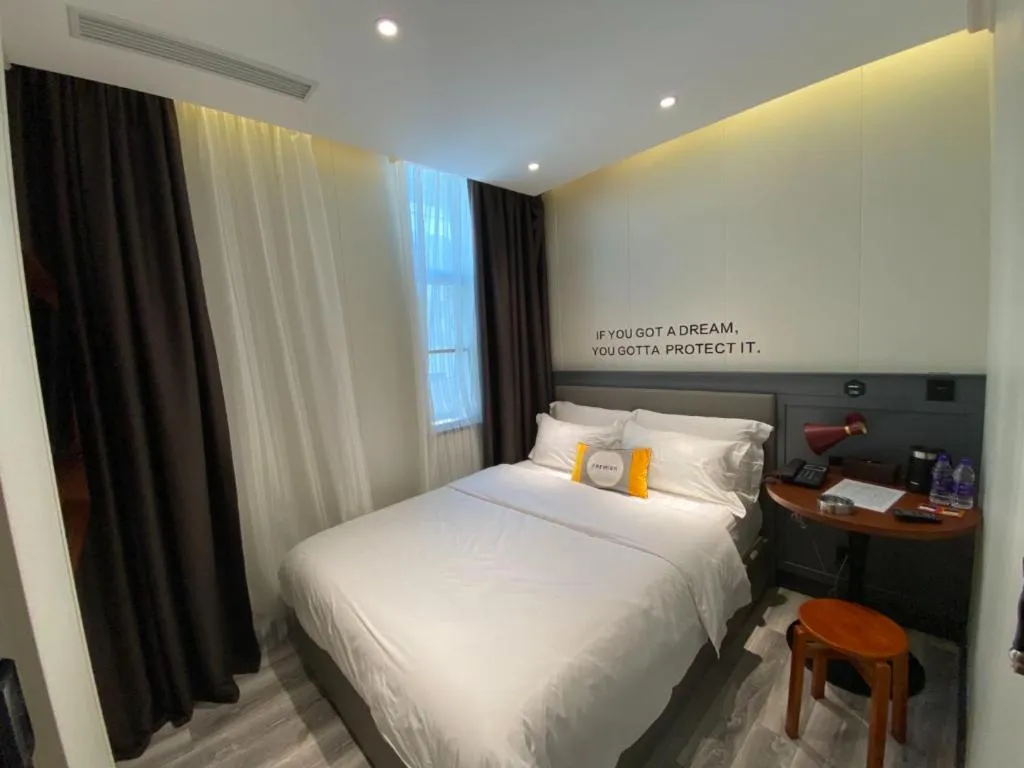 Bed in City Comfort Premier Hotel Guangzhou Tower Chigang Metro Station Pazhou Exhibition