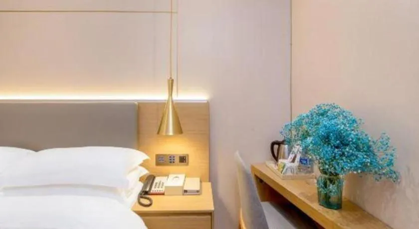 Bed in Echarm Hotel Guangzhou Gangding Huashi Metro Station