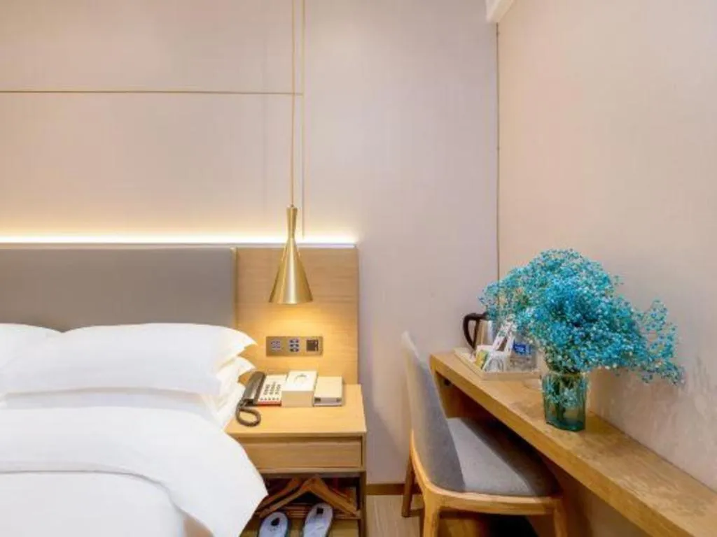 Bed in Echarm Hotel Guangzhou Gangding Huashi Metro Station