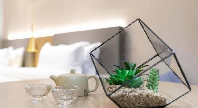 Bed in Echarm Hotel Guangzhou Gangding Huashi Metro Station