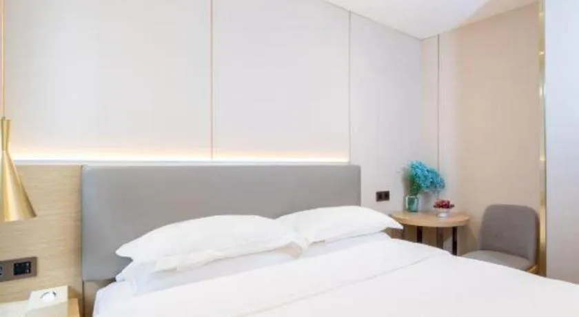 Bed in Echarm Hotel Guangzhou Gangding Huashi Metro Station