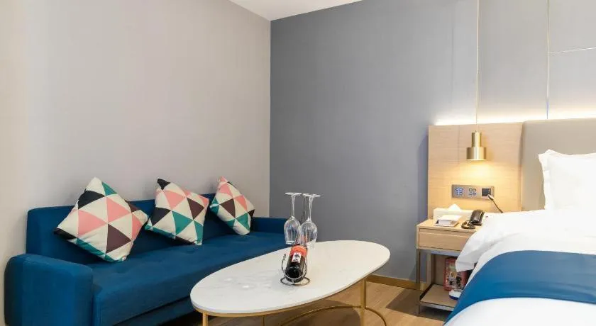 Bed in Echarm Hotel Guangzhou Gangding Huashi Metro Station