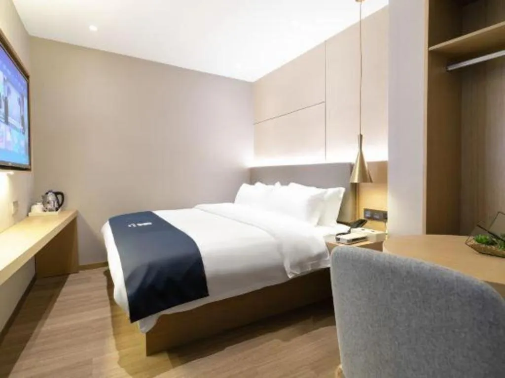 Bed in Echarm Hotel Guangzhou Gangding Huashi Metro Station