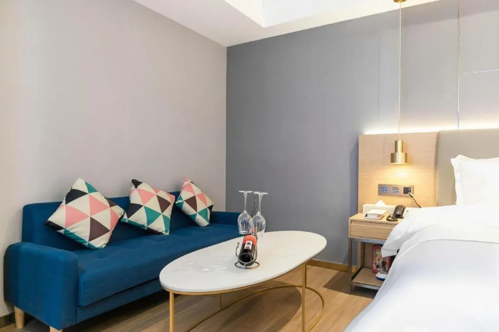 Bed in Echarm Hotel Guangzhou Gangding Huashi Metro Station