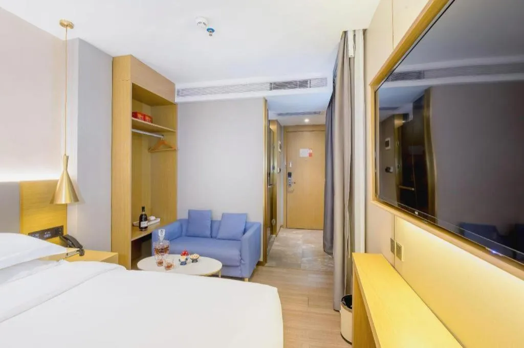 Bed in Echarm Hotel Guangzhou Gangding Huashi Metro Station