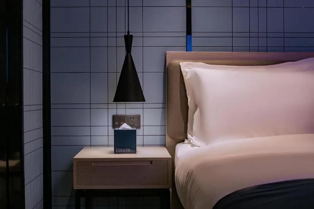 Bed in Echarm Hotel Shenzhen International Exhibition Center Fuyong