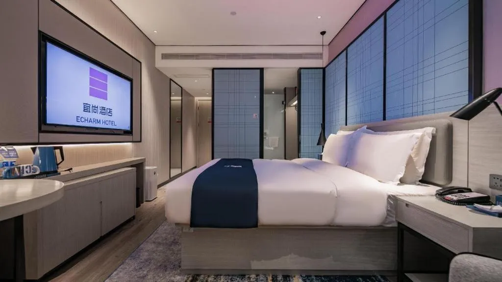 Bed in Echarm Hotel Shenzhen International Exhibition Center Fuyong