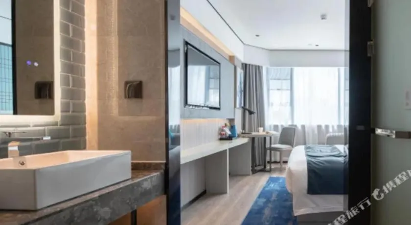 Bed in Echarm Hotel Shenzhen International Exhibition Center Fuyong