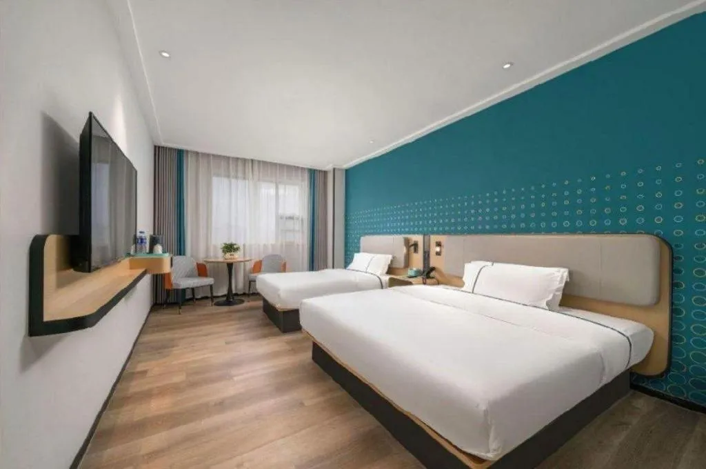 Bed in Echarm Hotel Shenzhen International Exhibition Center Fuyong