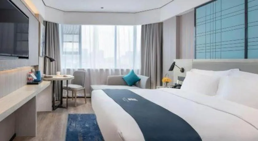 Bed in Echarm Hotel Shenzhen International Exhibition Center Fuyong