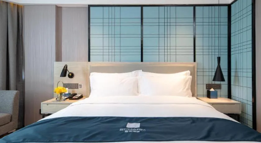 Bed in Echarm Hotel Shenzhen International Exhibition Center Fuyong